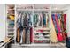 Spacious walk-in closet with custom shelving, hanging rods, and ample storage space at 2121 Harmony Dr, Canton, GA 30115