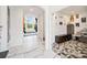 Spacious hallway with white walls, marble floors, with high ceiling and views to the living room at 2121 Harmony Dr, Canton, GA 30115
