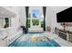 Bright, open living room with high ceilings, large windows, and modern furniture at 2121 Harmony Dr, Canton, GA 30115