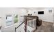 Spacious loft area with multiple windows, staircase, and comfortable seating at 2121 Harmony Dr, Canton, GA 30115
