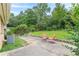 Outdoor patio area featuring two chairs, a small table, and lush green lawn at 3947 Veracruz Ct, Decatur, GA 30034