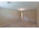 Spacious basement featuring neutral paint, plush carpeting and easy access to other rooms at 3947 Veracruz Ct, Decatur, GA 30034