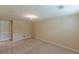 Basement area featuring plush carpeting and a door to another room at 3947 Veracruz Ct, Decatur, GA 30034