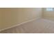 Bedroom showing neutral carpeting, white trim, and tan walls at 3947 Veracruz Ct, Decatur, GA 30034