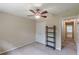 Bedroom with neutral walls, carpet, closet, and ceiling fan at 3947 Veracruz Ct, Decatur, GA 30034