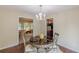 Charming dining area adjacent to the living room and kitchen, ideal for Gathering meals at 3947 Veracruz Ct, Decatur, GA 30034