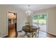 Inviting dining room space with views of both the backyard and the upstairs living area at 3947 Veracruz Ct, Decatur, GA 30034