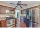 Modern kitchen with stainless steel appliances, hardwood floors, and ample counter space for meal preparation at 3947 Veracruz Ct, Decatur, GA 30034