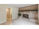 Charming living area with a brick fireplace and seamless access to the bathroom at 3947 Veracruz Ct, Decatur, GA 30034