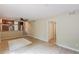 Open-concept living area featuring tiled flooring and easy access to the kitchen and stairs at 3947 Veracruz Ct, Decatur, GA 30034