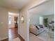 Open concept living space showcasing hardwood floors, ample light, neutral paint and transitional furniture at 3947 Veracruz Ct, Decatur, GA 30034
