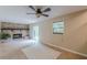 Inviting living room boasts brick fireplace, ceiling fan, and sliding glass doors to the outside at 3947 Veracruz Ct, Decatur, GA 30034