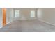 Bedroom featuring neutral walls and carpeting, with windows offering natural light at 4938 Wewatta Sw St, Atlanta, GA 30331