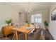 Dining room featuring a wooden table, six chairs, and classic chandelier at 4938 Wewatta Sw St, Atlanta, GA 30331