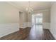 Dining room with decorative wainscoting and modern chandelier at 4938 Wewatta Sw St, Atlanta, GA 30331