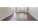 Bright living room featuring hardwood floors and ample natural light at 4938 Wewatta Sw St, Atlanta, GA 30331
