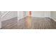Spacious living area featuring stairs and hardwood floors at 4938 Wewatta Sw St, Atlanta, GA 30331