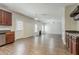 Open-concept living room flowing into a kitchen area at 4938 Wewatta Sw St, Atlanta, GA 30331