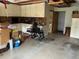 Garage area with storage cabinets and a wheelchair at 750 Providence Dr, Lawrenceville, GA 30044