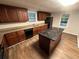 Updated kitchen featuring ample cabinet space, granite countertops, and modern appliances at 1095 S Burnt Hickory Rd, Douglasville, GA 30134
