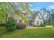 Inviting two-story home featuring a well-manicured lawn and charming curb appeal at 229 Primstone Way, Mcdonough, GA 30253