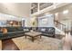 Inviting living room area with an open floor plan, high ceilings, and hardwood floors at 229 Primstone Way, Mcdonough, GA 30253