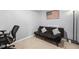 Functional spare room featuring a futon and desk space, providing flexibility for various needs at 229 Primstone Way, Mcdonough, GA 30253