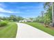 Stunning two-story home with a long driveway and well-manicured lawn at 6301 New Bethany Rd, Buford, GA 30518