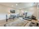Functional home gym with various workout machines, a ceiling fan, and plenty of space for exercise at 6301 New Bethany Rd, Buford, GA 30518