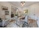 Comfortable home office featuring a wooden desk, arm chair, and stylish decor at 6301 New Bethany Rd, Buford, GA 30518