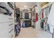 Spacious walk-in closet with custom shelving, ample storage, and organized racks for clothing and accessories at 6301 New Bethany Rd, Buford, GA 30518