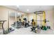 Home gym featuring a weight rack, free weights, and exercise equipment at 9595 Rod Rd, Alpharetta, GA 30022