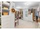 Spacious walk-in closet with built-in shelving and drawers for optimal storage at 9595 Rod Rd, Alpharetta, GA 30022