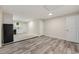 Open-concept living space features modern flooring, neutral paint, and a stylish kitchen area at 1268 Ladd Sw St, Atlanta, GA 30310