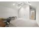Large bedroom with vaulted ceilings, fan, skylight, neutral walls, and closet space at 1678 Rabke Rd, Canton, GA 30114
