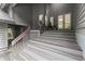 Welcoming entrance with wooden steps and stylish architectural design at 1678 Rabke Rd, Canton, GA 30114