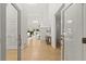 Bright foyer with gleaming hardwood floors and high ceilings, filled with natural light at 1678 Rabke Rd, Canton, GA 30114