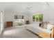 Spacious main bedroom boasts natural light and modern finishes at 1678 Rabke Rd, Canton, GA 30114