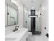 Bright modern bathroom featuring double vanity, luxurious shower, and elegant finishes at 178 Wesley Ne Ave # B, Atlanta, GA 30307