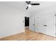 Spacious bedroom with hardwood flooring, ceiling fan, and double door closet at 178 Wesley Ne Ave # B, Atlanta, GA 30307