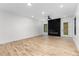 Spacious living room features hardwood floors, fireplace, ample natural light and backyard access at 178 Wesley Ne Ave # B, Atlanta, GA 30307