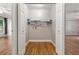 Interior view of a small closet with wire shelving and wood-look floors at 3357 Saddleton Way, Douglasville, GA 30134