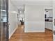 Inviting entryway with hardwood floors leading to a bright, open floor plan, and decorative front door at 3357 Saddleton Way, Douglasville, GA 30134