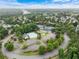 An aerial view showcases the community's amenities, including the pool, tennis courts, and lush landscaping at 412 Mcafee Nw Ct # 14, Kennesaw, GA 30144