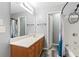Full bathroom with wood look floors, a wide vanity, and shower and tub combination at 412 Mcafee Nw Ct # 14, Kennesaw, GA 30144