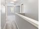 Hallway with carpet and view into room at 412 Mcafee Nw Ct # 14, Kennesaw, GA 30144