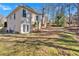 View of back exterior showing yard at 4990 Sawgrass Nw Pl, Acworth, GA 30102