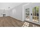 Finished basement featuring laminate floors, an oven, and a door at 4990 Sawgrass Nw Pl, Acworth, GA 30102