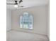 Bedroom featuring ceiling fan and view from window at 4990 Sawgrass Nw Pl, Acworth, GA 30102