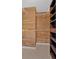 Walk-in closet featuring custom cedar planking and shelving at 4990 Sawgrass Nw Pl, Acworth, GA 30102